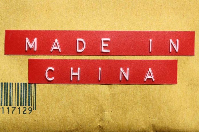 shutterstock_93197578.jpg Red label reading MADE IN CHINA on brown packaging