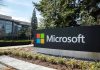Microsoft Pulls Plug—Millions Set To Lose Accounts Microsoft sign with office buildings and trees.
