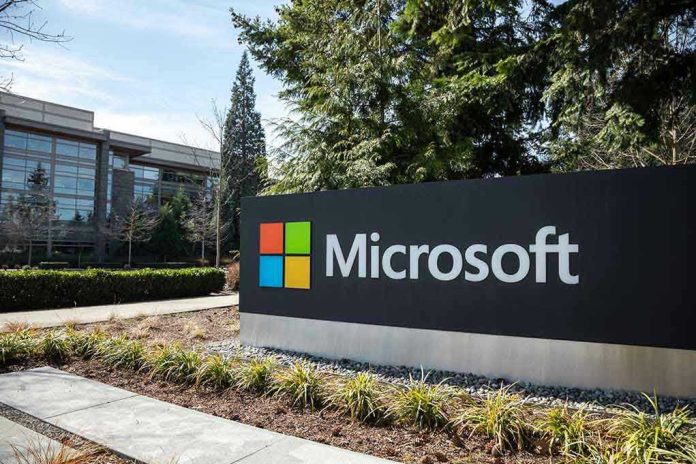 1357496909 Microsoft sign with office buildings and trees.