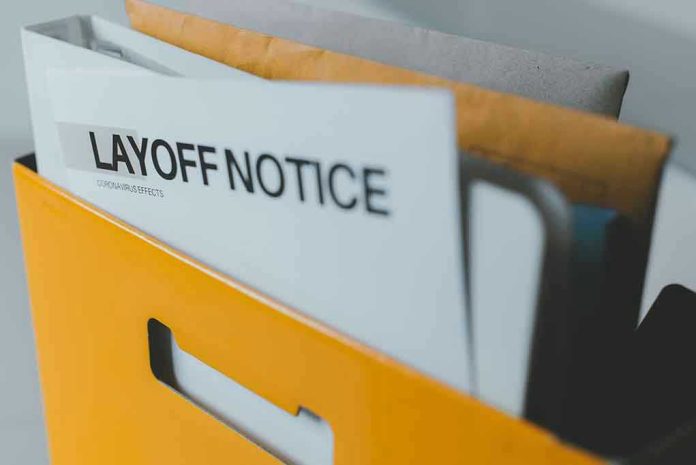 172298839 Layoff notice in a yellow box.