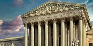 SCOTUS Funding Nears Zero – Reserves DRAINED! Building with columns and statues in front of entrance.