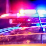 ANOTHER College Football Shooting – Campus Massacre! Police car lights flashing at night.