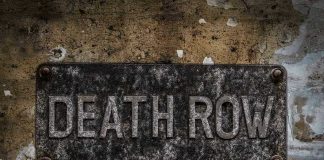 Death Row Twist—Final Words Send Chills! Weathered Death Row sign on aged concrete wall