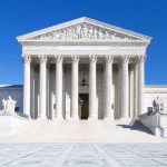 BOMBSHELL SCOTUS Ruling – Defamation Suit Stands! The Supreme Court building featuring marble columns and a clear blue sky