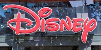 Disney Tragedy STUNS Guests — Heartbreaking! Bright red Disney logo displayed on a storefront window