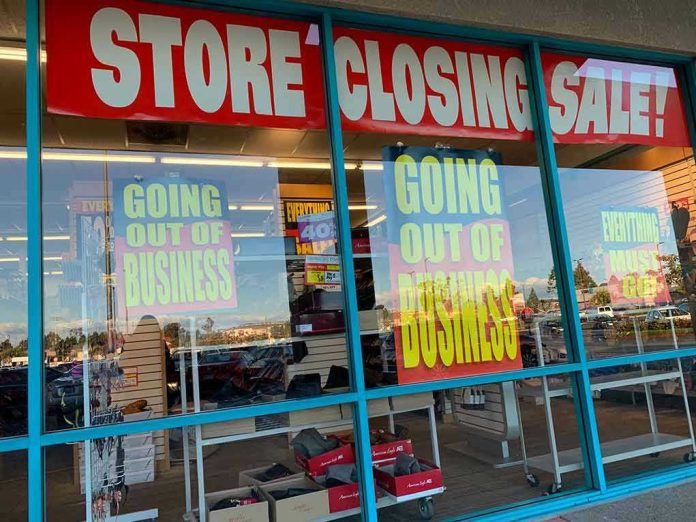 1321323716 Store closing sale with going out of business signs.