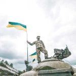Ukraine Releases KILLER Robot Trucks – Military World STUNNED Soldier on tank holding Ukrainian flag.
