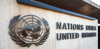 Facade of the United Nations building featuring the UN emblem and text