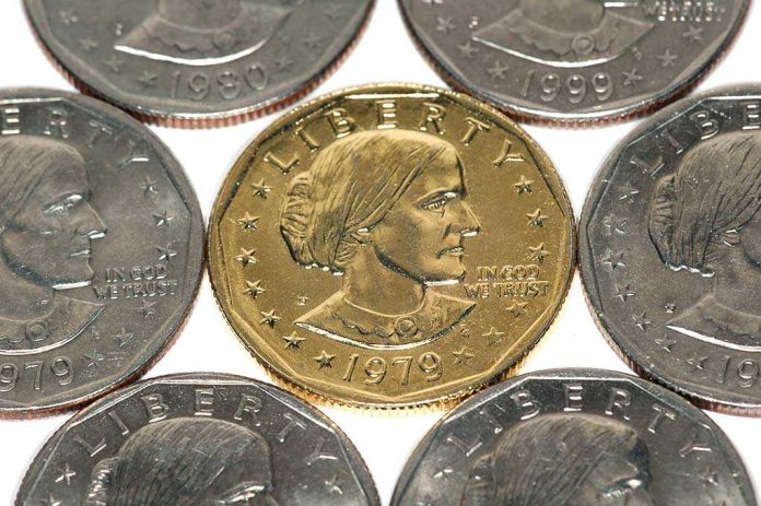 shutterstock_3478782.jpg A collection of coins featuring a gold coin surrounded by silver coins