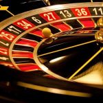 3 Casino Builds APPROVED – Major City Begins Planning Close-up of roulette wheel with spinning ball.