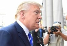 Congo-Rwanda Peace Deal Nearly DERAILED by Sleepy Trump Man in suit with photographers in background.