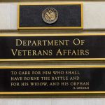 Trump Signs Massive Victory – Veteran’s Compensation SKYROCKETS! Department of Veterans Affairs building sign with quote.