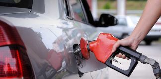 Energy Sec Announces Gas Change – See What’s Coming A person refueling a car at a gas station