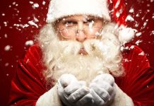 How Marketing Hijacked Santa Claus Santa Claus blowing snowflakes with a joyful expression