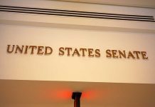 Sign displaying United States Senate in a government building