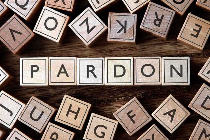 shutterstock_403829578 (3).jpg Wooden letter blocks arranged to spell 'PARDON' on a wooden surface