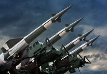 Canada Purchases Weapons STOCKPILE – Washington Stunned! Array of missile launchers positioned against a dramatic sky