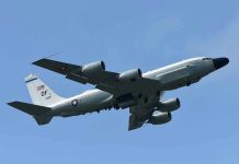 Old B-52 Bombers, New Threats: Air Force’s Plan Military aircraft flying in clear blue sky.
