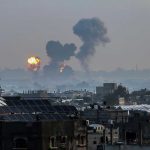 Sonic Weapon ALLEGATIONS: Truth or Fiction? Flames and smoke billowing over a cityscape.