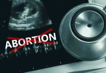 Legal Storm Brews Over Abortion Pill Rules Ultrasound, stethoscope, and ABORTION crossed out in red.