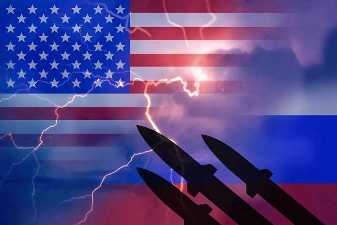 724090102. U.S. and Russian flags with missiles and lightning.