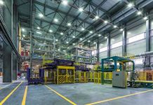 Interior view of a modern industrial facility with manufacturing equipment