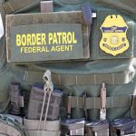 Trump’s ICE Doubles Overnight—Left PANICS Border Patrol vest with gear and communication equipment.