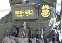 Trump’s ICE Doubles Overnight—Left PANICS Border Patrol vest with gear and communication equipment.