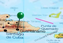 Cuban Chaos: Is Regime Collapse Imminent? Map with pin on Guantánamo, Cuba.