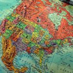 Predator’s Cross-Country Scheme EXPOSED — Teen Safe Close-up of a vintage globe highlighting North America