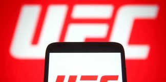 UFC logo on phone screen and background.
