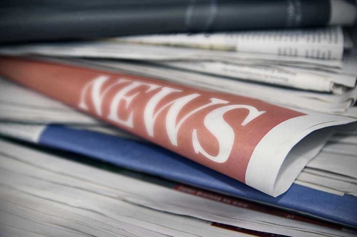 Stack of newspapers with NEWS headline visible.