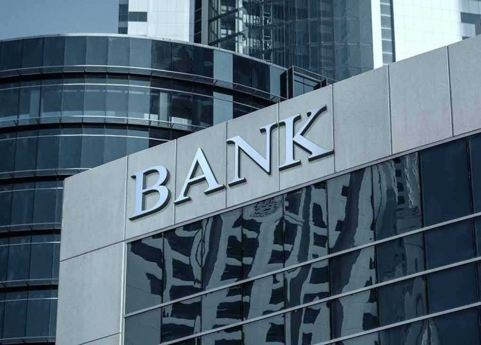 574713295 Bank building with reflective glass windows.