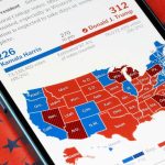 Map showing US election results on smartphone screen