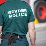 Border Shock: Turnbacks Upheld By Justices Person in Border Police uniform standing outdoors.