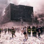 Russia Vows Payback—Escalation Looms Emergency responders and civilians amidst debris at a disaster site