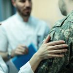 Army Captain’s Chilling Abortion Plot Doctors comforting a person in military uniform