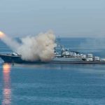 Ceasefire Obliterated: What Did Iran Really Hit? Warship firing missile in the sea.