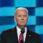 Hunter’s Bombshell: Dad’s ‘Biggest Mistake’ Man in suit speaking at a podium