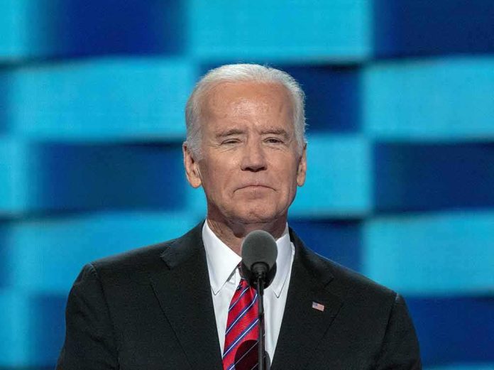 Man in suit speaking at a podium