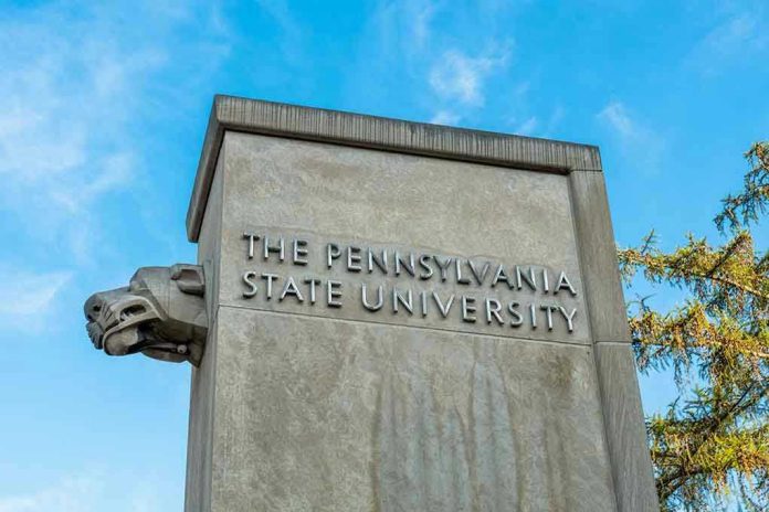 1584859210 The Pennsylvania State University stone pillar with lion sculpture.