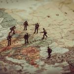Ambassador Axed Amid Kyiv Corruption Storm Toy soldiers on a map of Eastern Europe