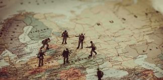 Ambassador Axed Amid Kyiv Corruption Storm Toy soldiers on a map of Eastern Europe