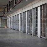 Putin Move Frees U.S. Marine — But Why Now? prison cell block with metal barred doors