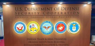 Navy Power Play: CIO Locked, Billions At Stake U.S. Department of Defense display wall with service seals
