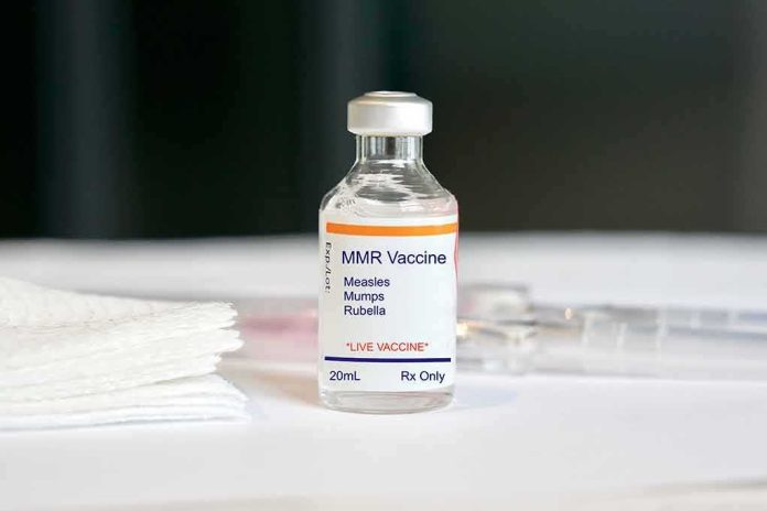 shutterstock_1314649226 MMR vaccine vial on a white surface