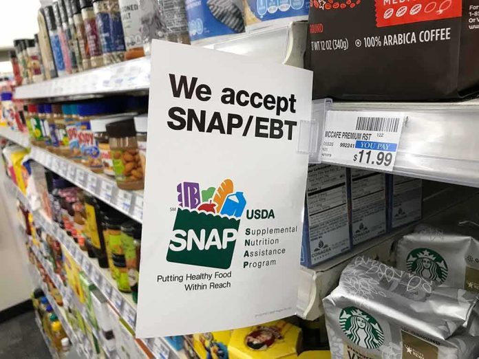 Shelf sign in a grocery aisle showing SNAP EBT acceptance