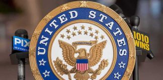 United States Senate seal at a podium