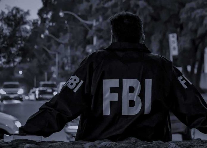 FBI agent in jacket facing a city street at dusk