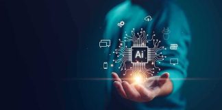 Hand holding glowing AI chip with digital circuit icons